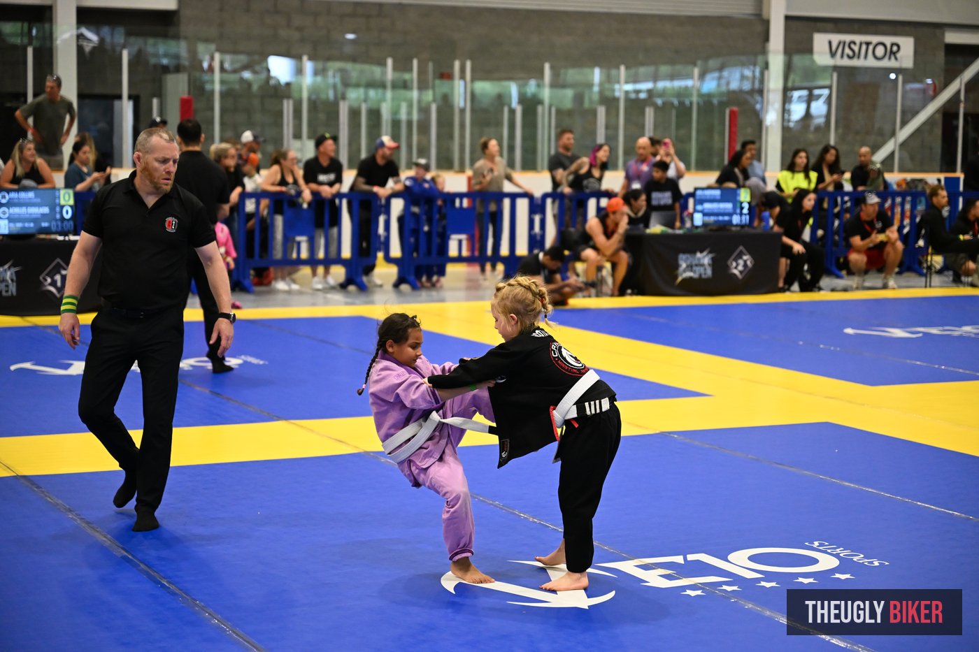 BJJ kids competition with referee